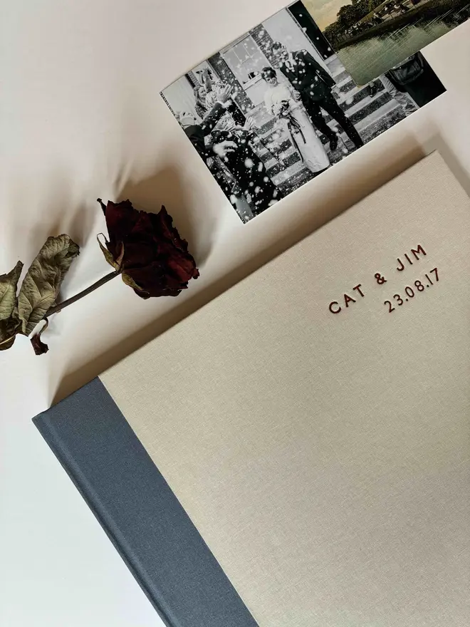 Handmade photograph album with contrasting spine in Steel Blue book cloth and Ivory sides
