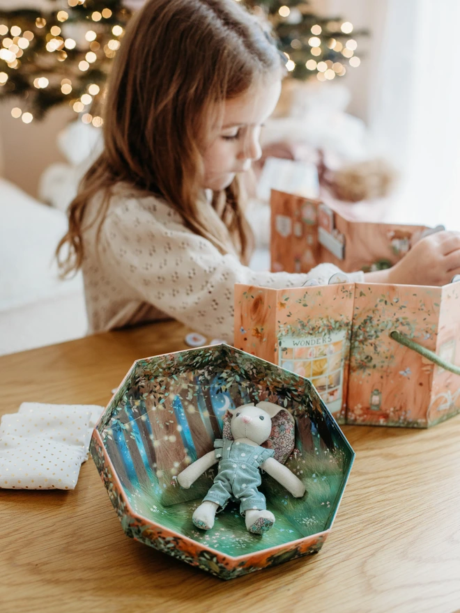 Betsy Bunny inside her woodland tree stump shop.  With her woodland animal friends and lots of prompts for imaginary play.