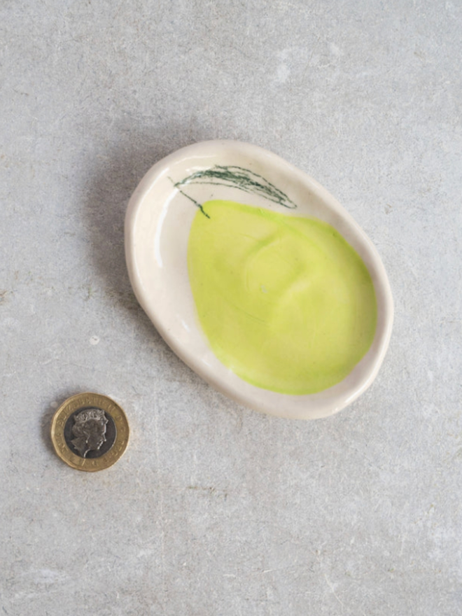 Wee Dishes. A dish with a pear design.