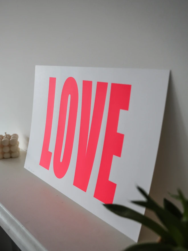 Love screen print in hot pink