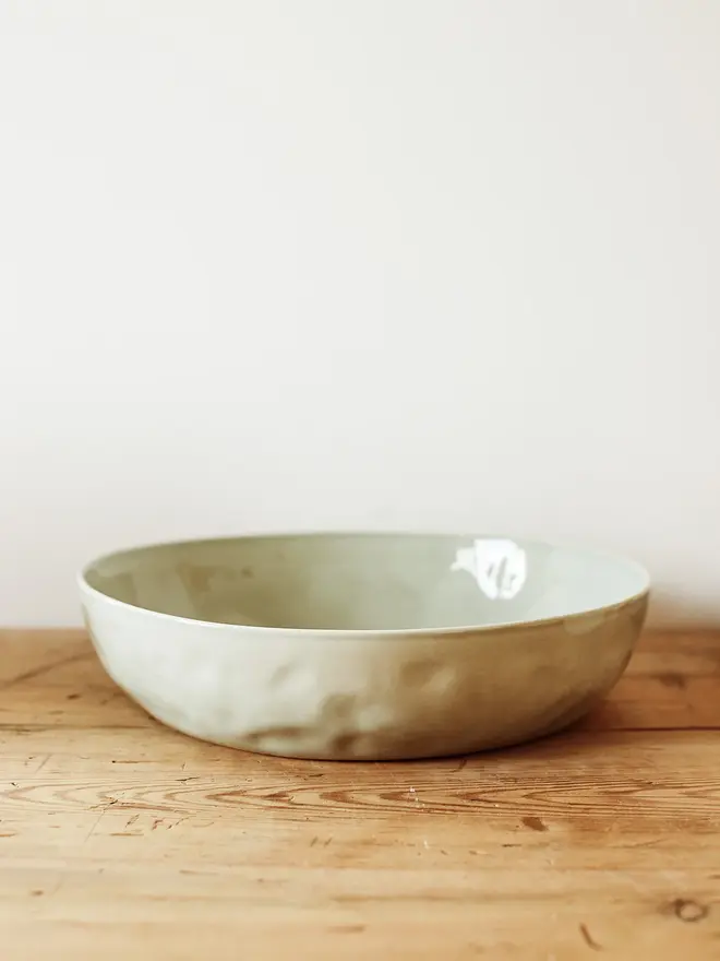 'seaglass' handcrafted stoneware bowls. a large green stoneware serving bowl.