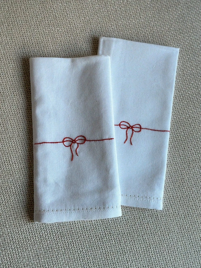 Embroidered bow napkin