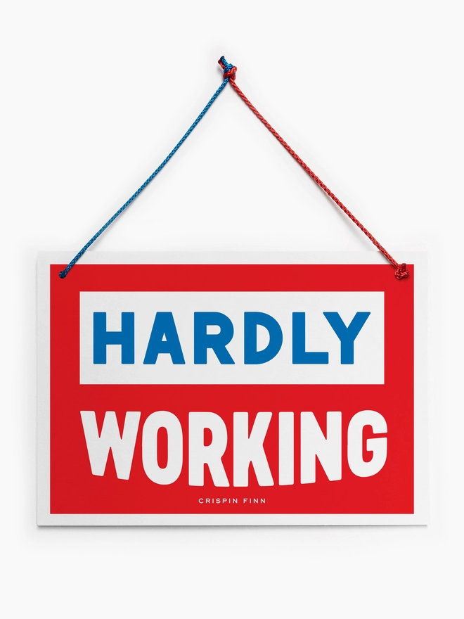 Printed Hanging sign with the words Working Hard on one side and Hardly Working on the other
