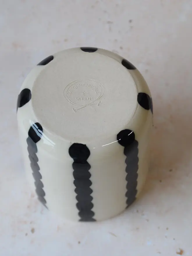 Handmade ceramic Stripe Pop tumbler — close-up showing black wavy stripe detail