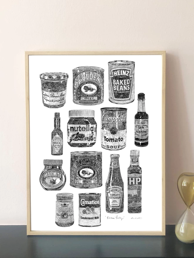 Art print of a hand drawn collection of illustrations of kitchen pantry food packaging displayed in a frame