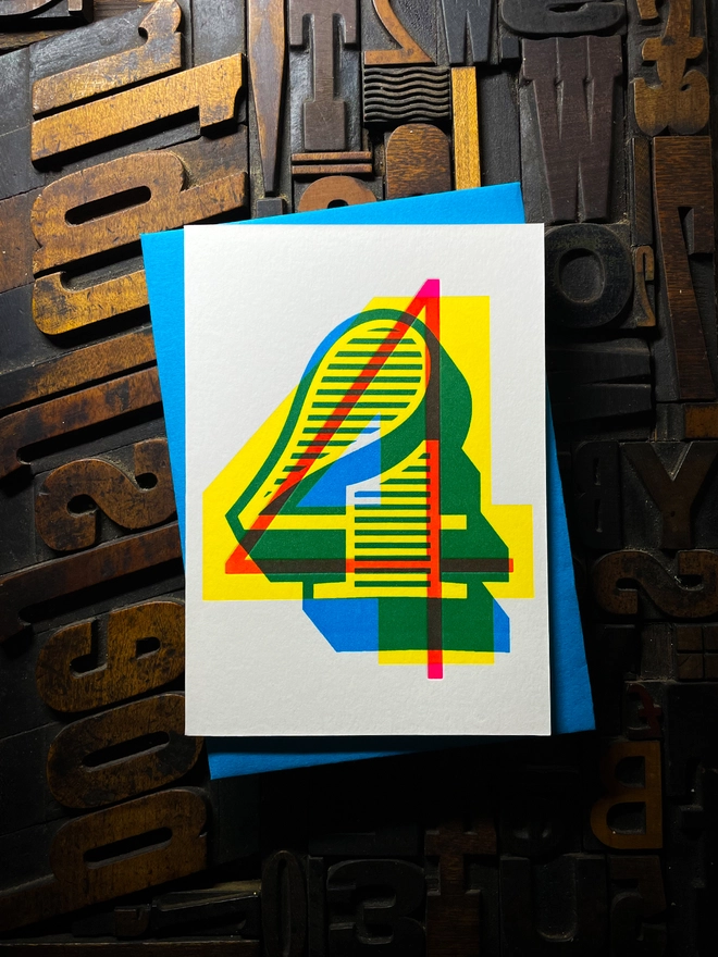 4th birthday anniversary milestone typographic letterpress card with deep impression print. Very colourful and vibrant. They show slight colour variations adding to the style anding to the charm of this handmade greeting card.