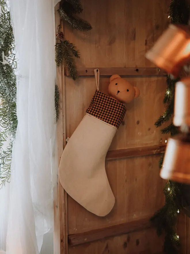 Handmade cotton Christmas stocking in neutral Scandinavian style Neutral cotton Christmas stocking for children’s room decor