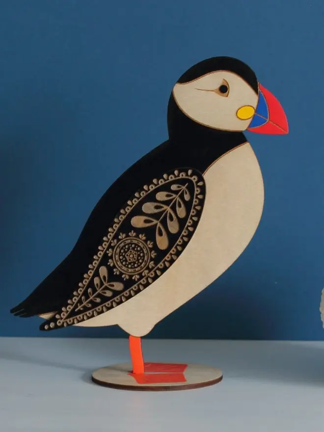 Standing Wooden Atlantic Puffin, wooden bird decoration standing on a platform. 