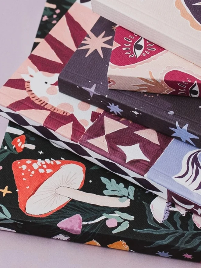 Mushrooms Notebook with other Sister Paper Co notebooks