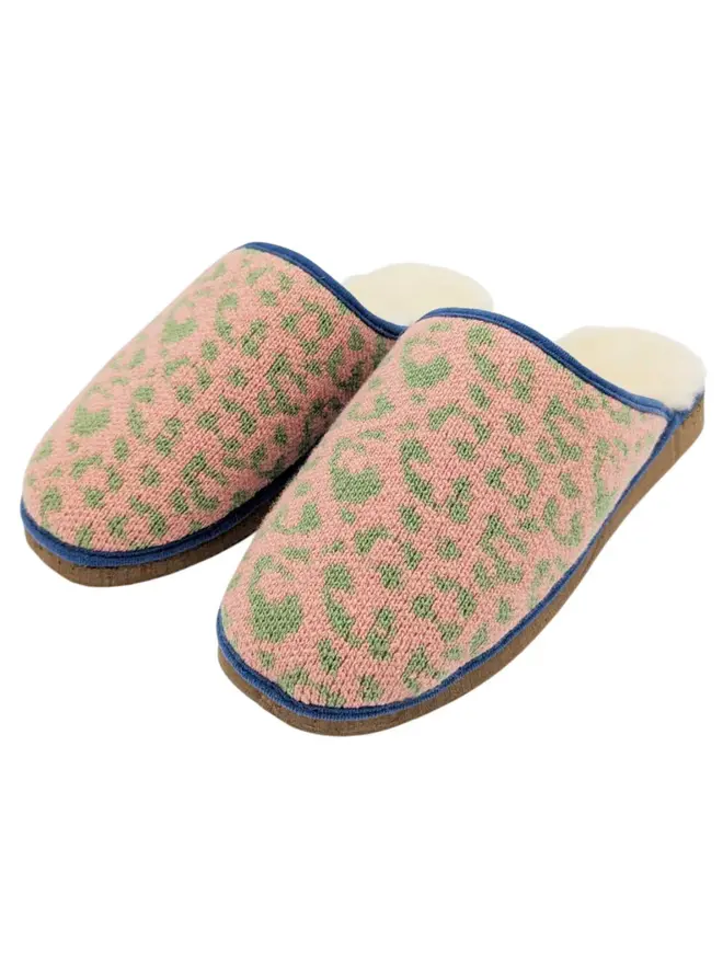 Women's Lambswool & Sheepskin Slippers, a pair of colourful slippers sitting on a white plain surface. 