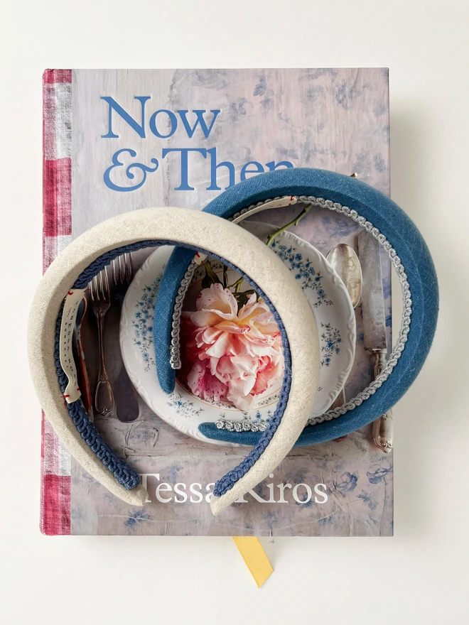 two padded headbands on a book