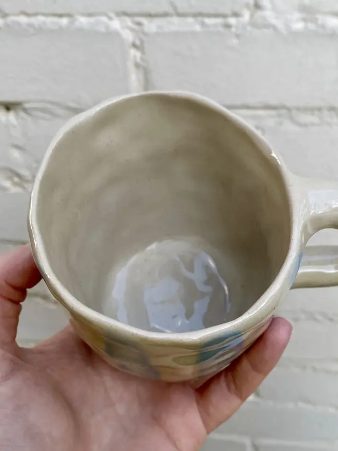 handmade ceramic smiley face blue white strip mug