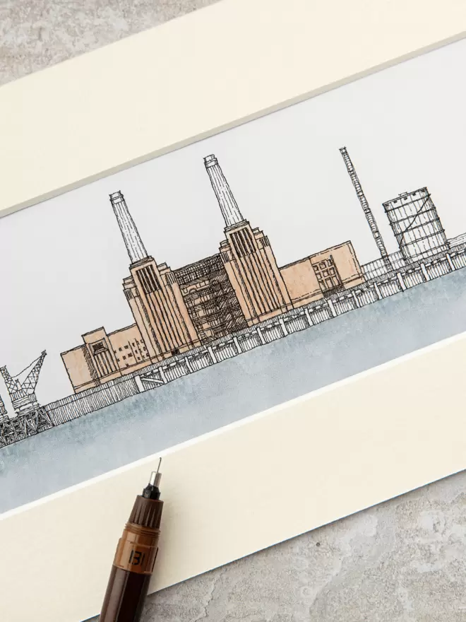 Detailed pen and watercolour drawing of Battersea Power Station, London, in a soft white mount