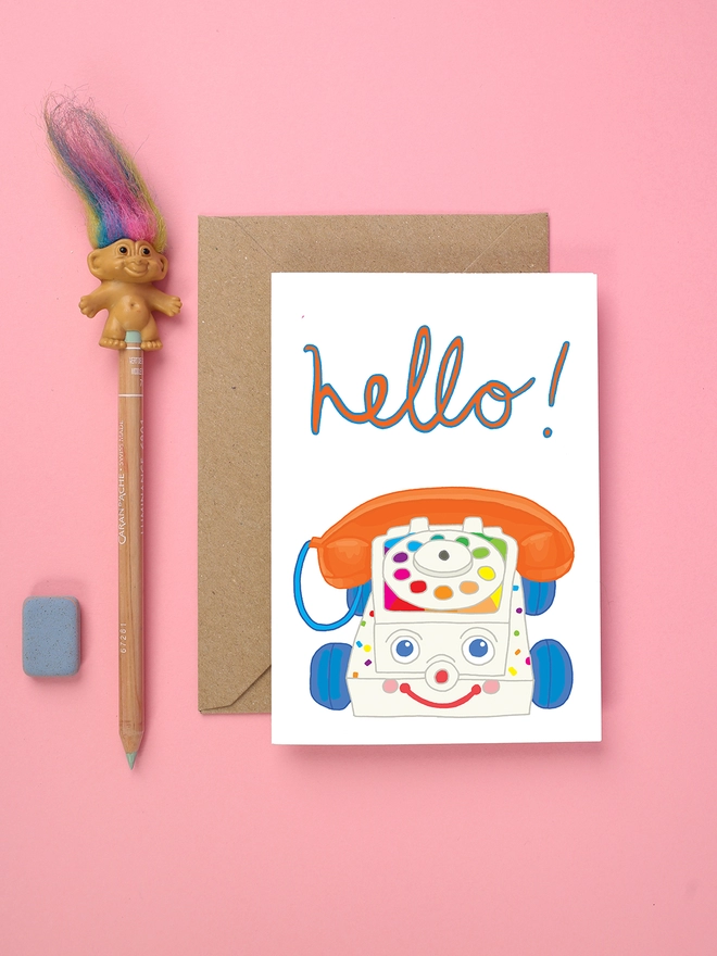 bright card featuring a classic toy phone