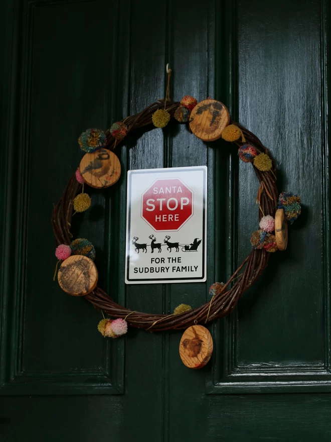 personalised Christmas sign like a UK road sign saying Stop Santa
