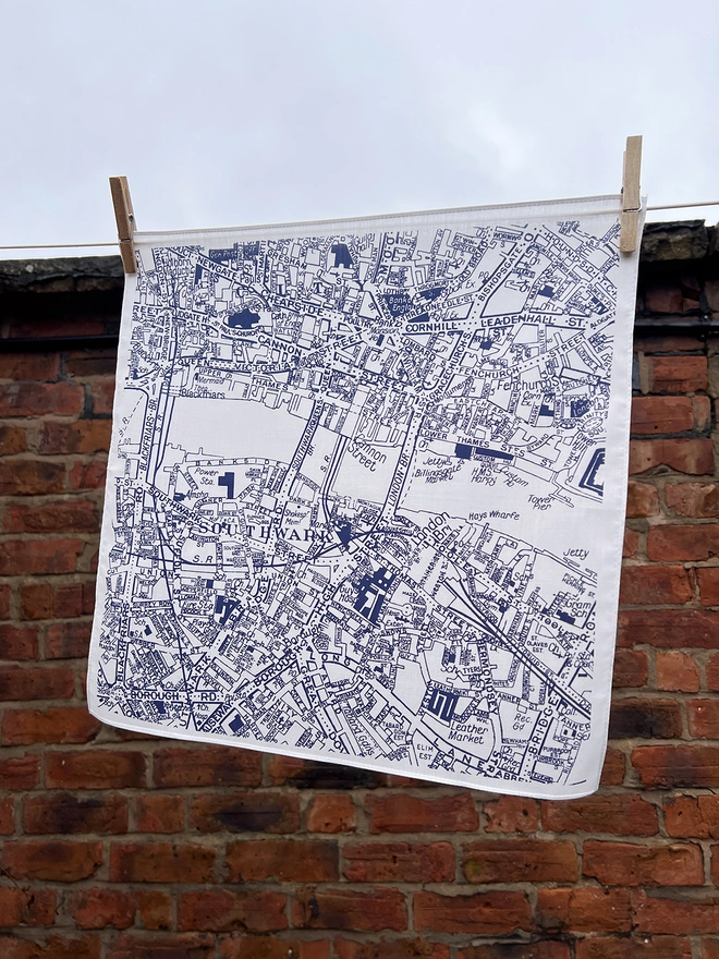 A Mr.PS London Bridge Map Handkerchief hanging outside on a washing line