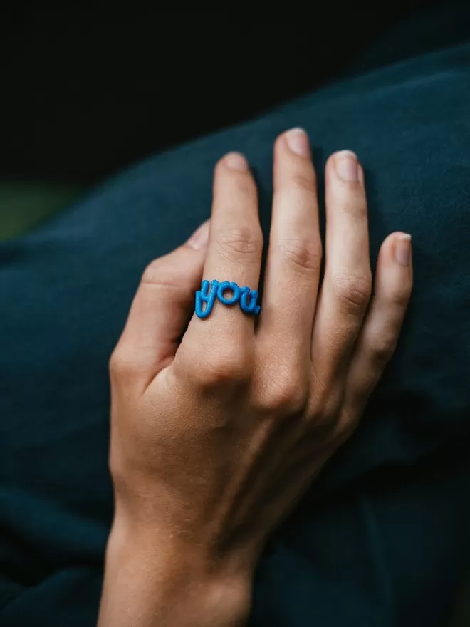 'You' Statement Reminder Ring in blue.