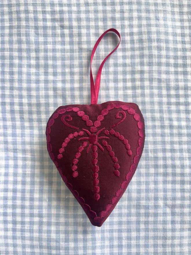 Silk heart ornament: maroon silk, dark pink thread and ribbon