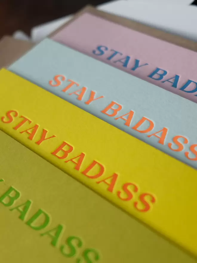 A set of colourful 'Stay Badass' notecards. 