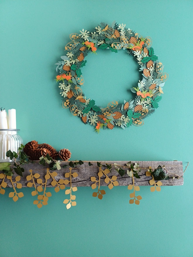 Gold Laurel Berry Garland displayed on mantelpiece