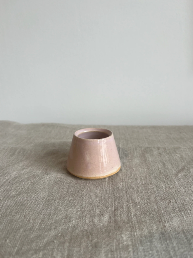 Egg Cup. A pink egg cup. The colour is solid.