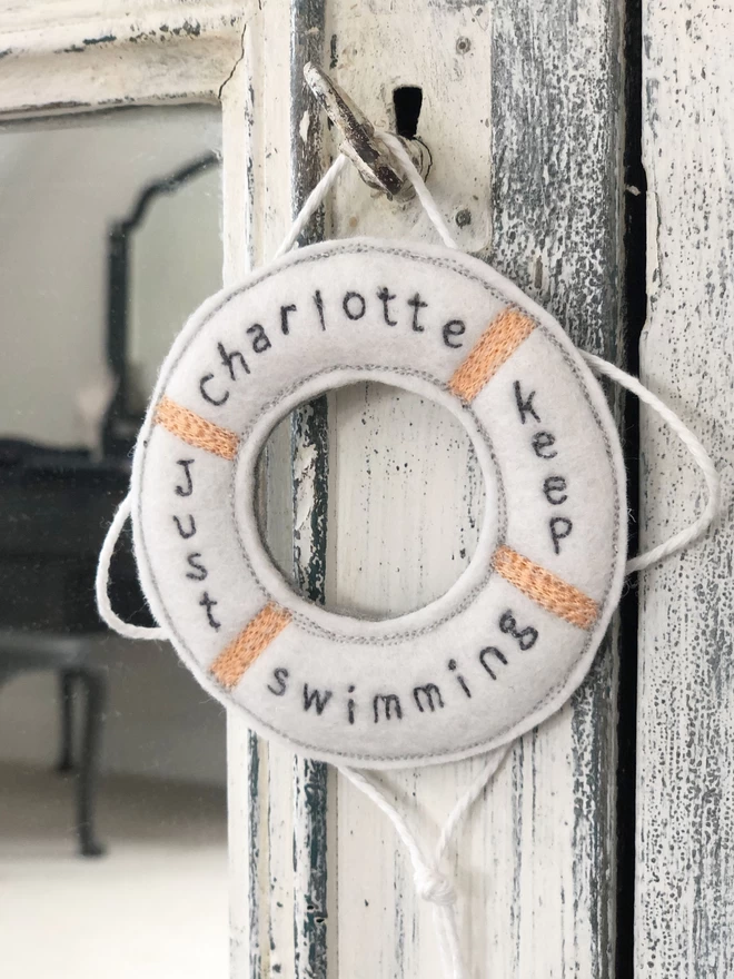 Just Keep Swimming Personalised Life Saver Ring on key on mirror door