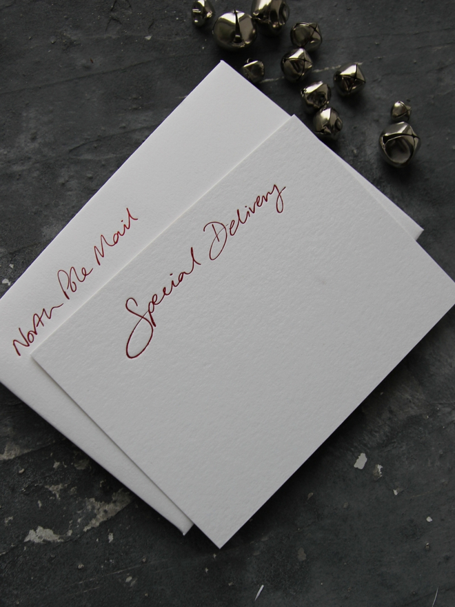 christmas notecard with Special Delivery in red foil comes with envelope which says North Pole Mail