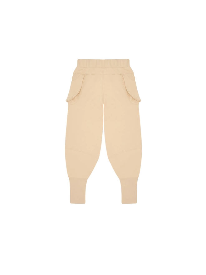 Luxury trouser made from cotton sweat with a brushed back interior for cosy-ness. Featuring 3D pockets and seam detailing to yoke and knee. Deep rib cuffs and rib detail to pocket.
