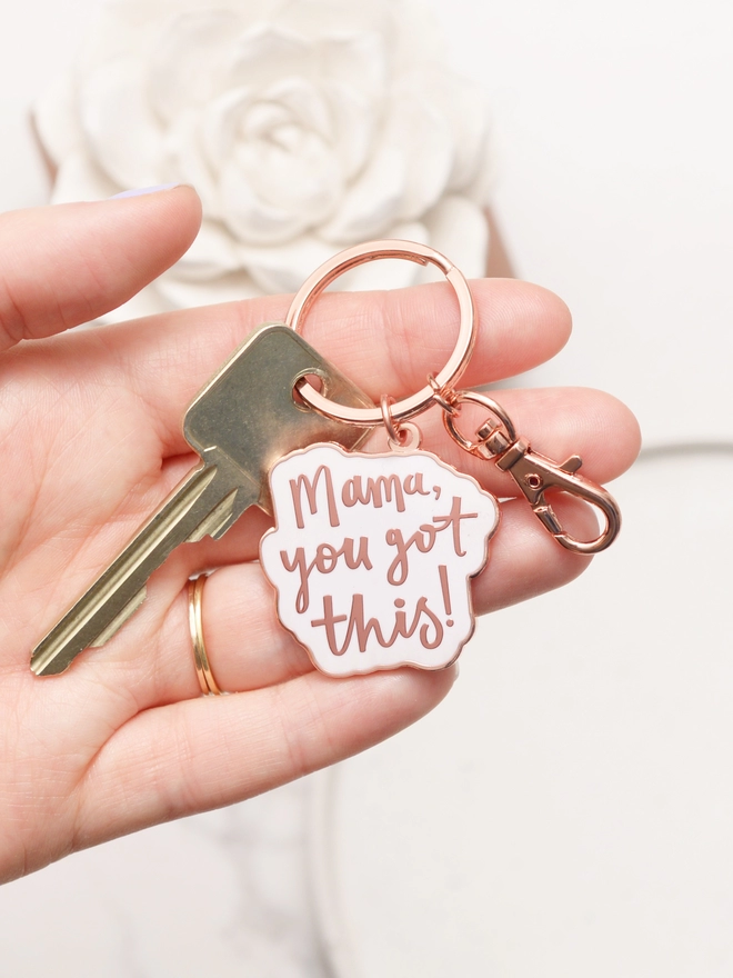 Hand holding the Mama you got this! enamel keyring