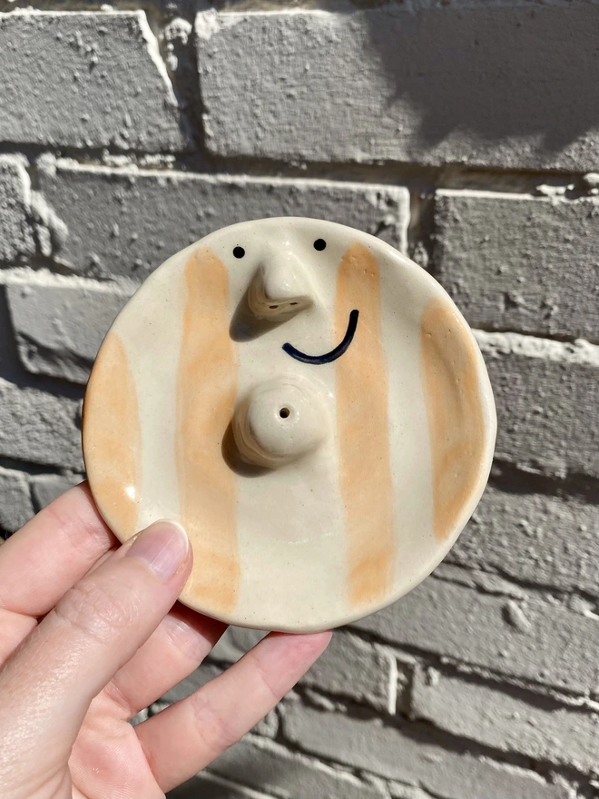 Orange incense dish