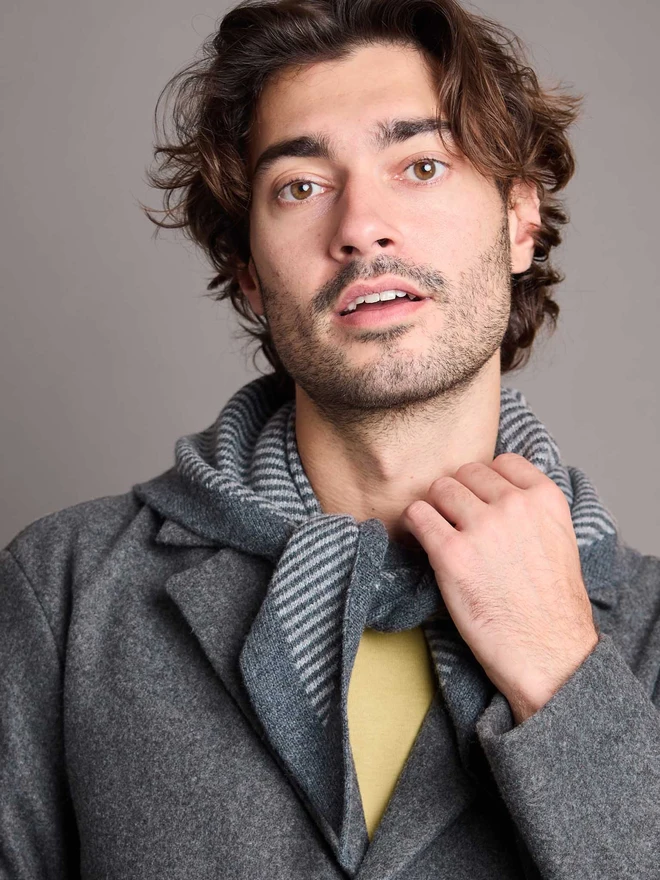 man wearing grey striped wool neckerchief