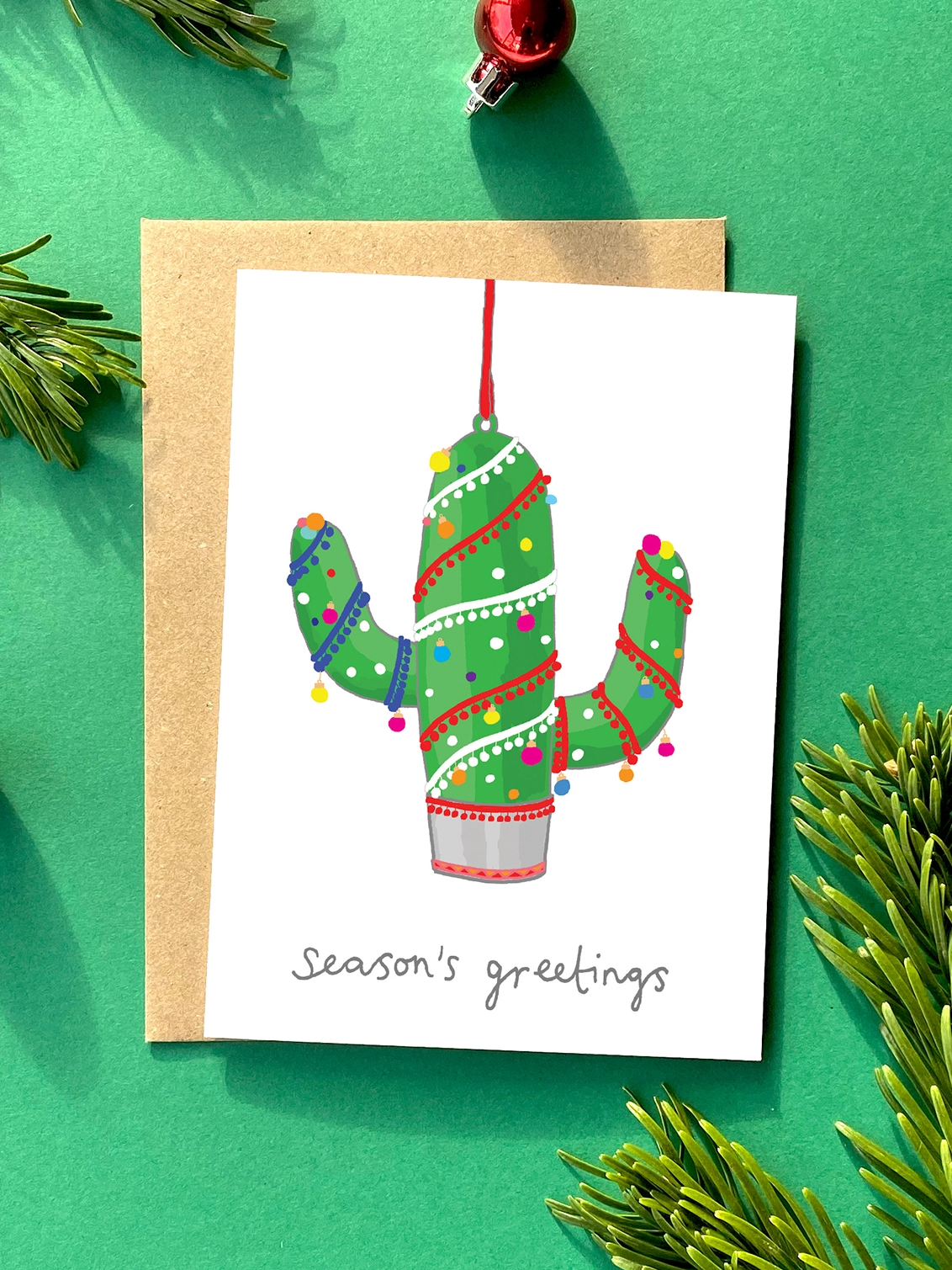 Christmas card with jolly cactus Christmas decoration