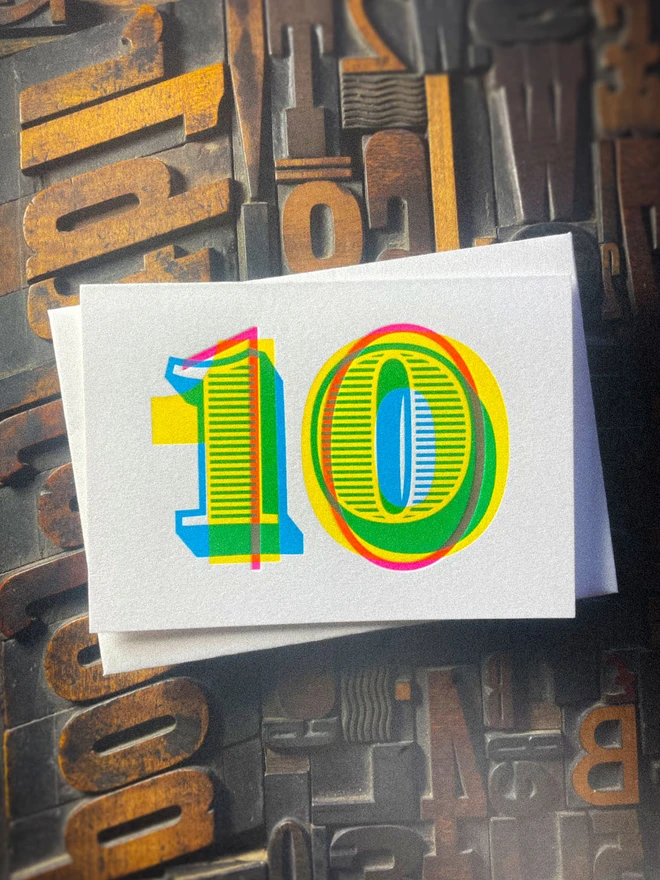 10th birthday anniversary typographic letterpress card. Deep impression print. Unique with no print being the same. They show slight colour variations adding to the style. Also available in other milestones : 1, 2, 3, 18, 21, 30, 40, 50, 60, 70, 80.