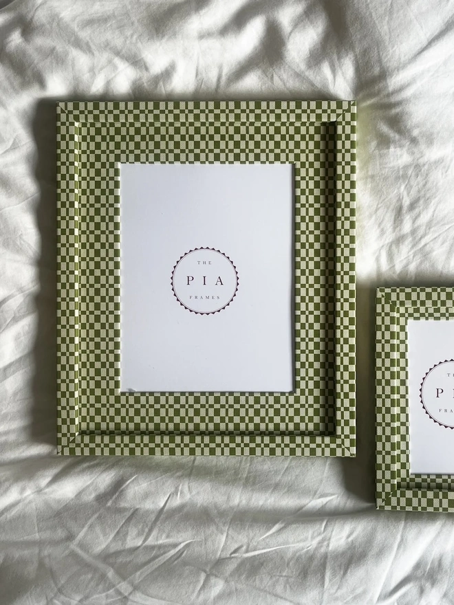 Green & Beige Checkered Frame, a colourful frame sitting on a plain white surface. 