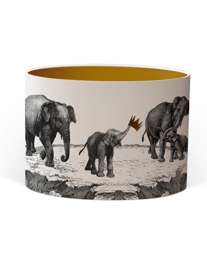 Drum Lampshade featuring elephants with a Gold inner on a white background