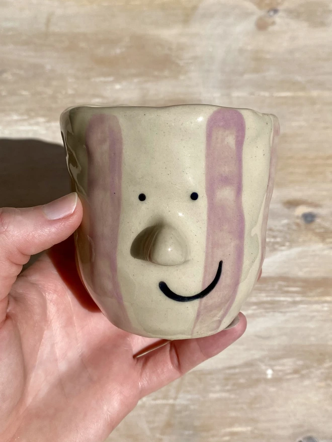 lilac stripe pot - held