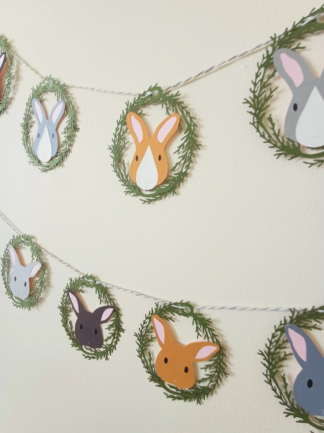 Easter Bunny Garland (5 bunny and 6 bunny options) displayed together on wall. 