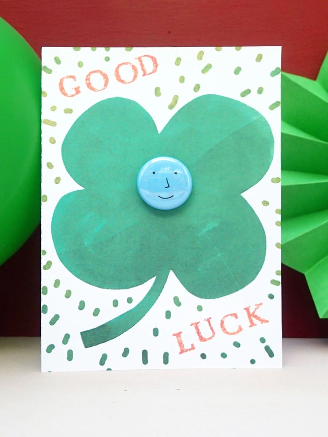 lucky clover good luck card with face pin badge