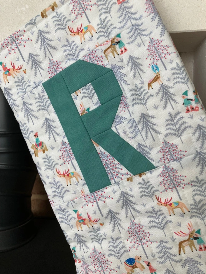Cooper and Fred Personalised Quilted Christmas Stocking in Elf Forest Print with Green Letter R