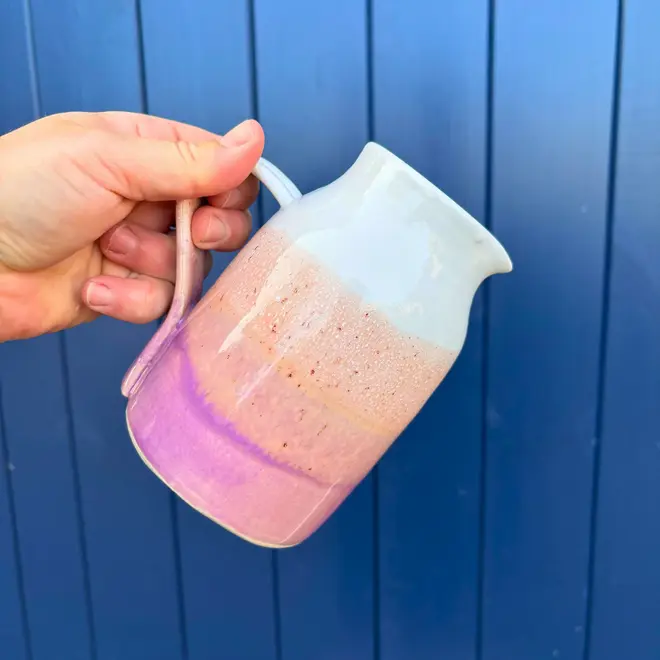 Ice Cream Sundae Jug, a colourful jug being poured against a navy blue backdrop. 