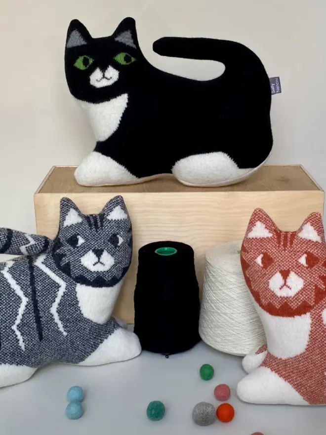 three plush cat toys