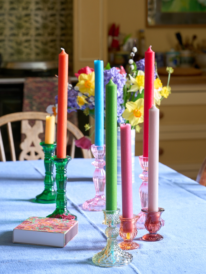 Boxed Candles. A selection of candles in candlestick holders.