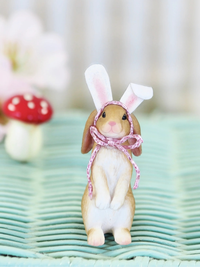 Rabbit Fancy Dress. A standing rabbit with a fancy dress pair of fluffy rabbit ears.