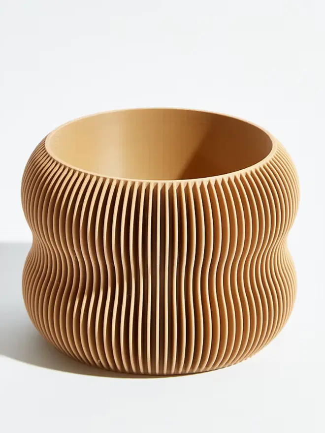 Sustainable 3D Printed Sand Beige Plant Pot, bubble design, against a white background.