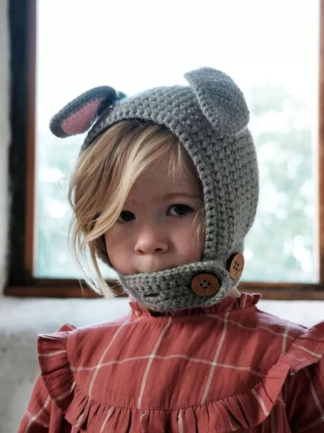 EKA Animal Bonnett seen on a child.