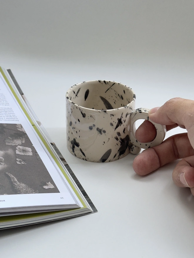 Black speckled modern ceramic mug
