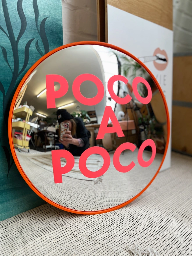 Convex painted mirror poco a poco