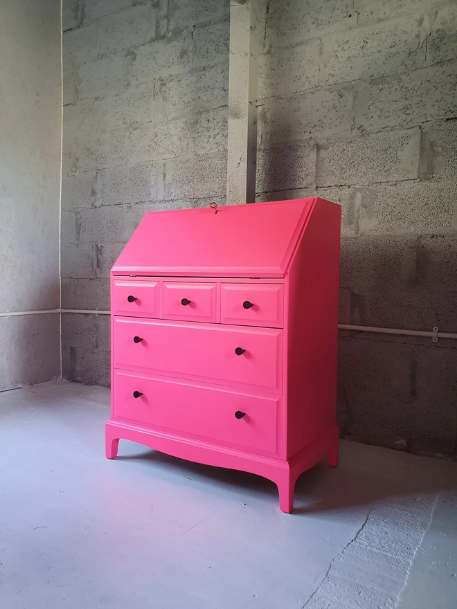 neon pink yellow bureau desk