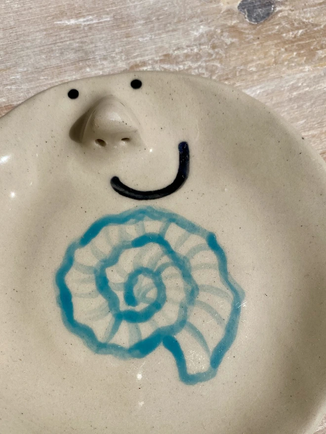 nautilus shell ceramic trinket tray - close up