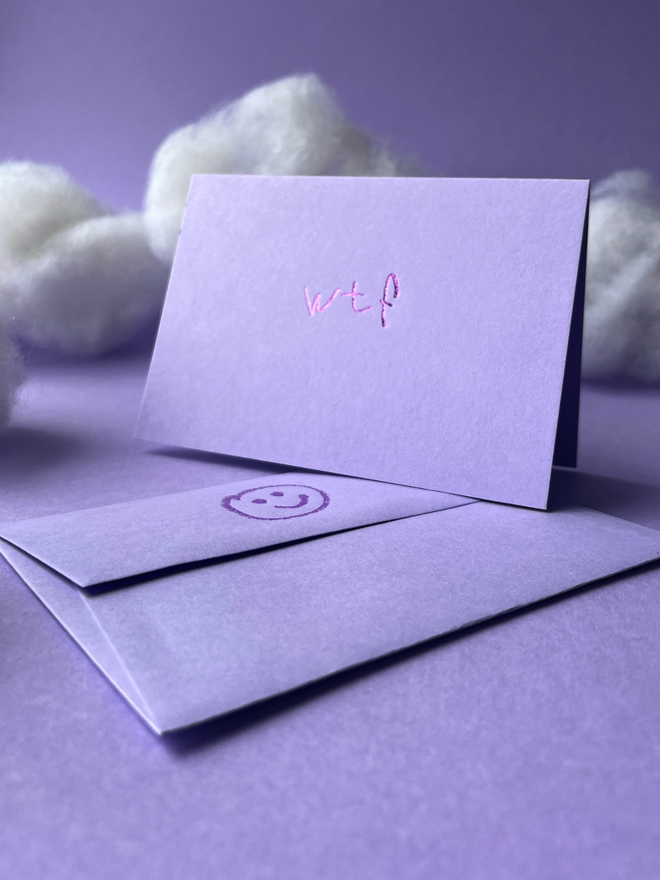 lavender coloured card with wtf short for 'what the fuck' hand foiled in kids hand writing